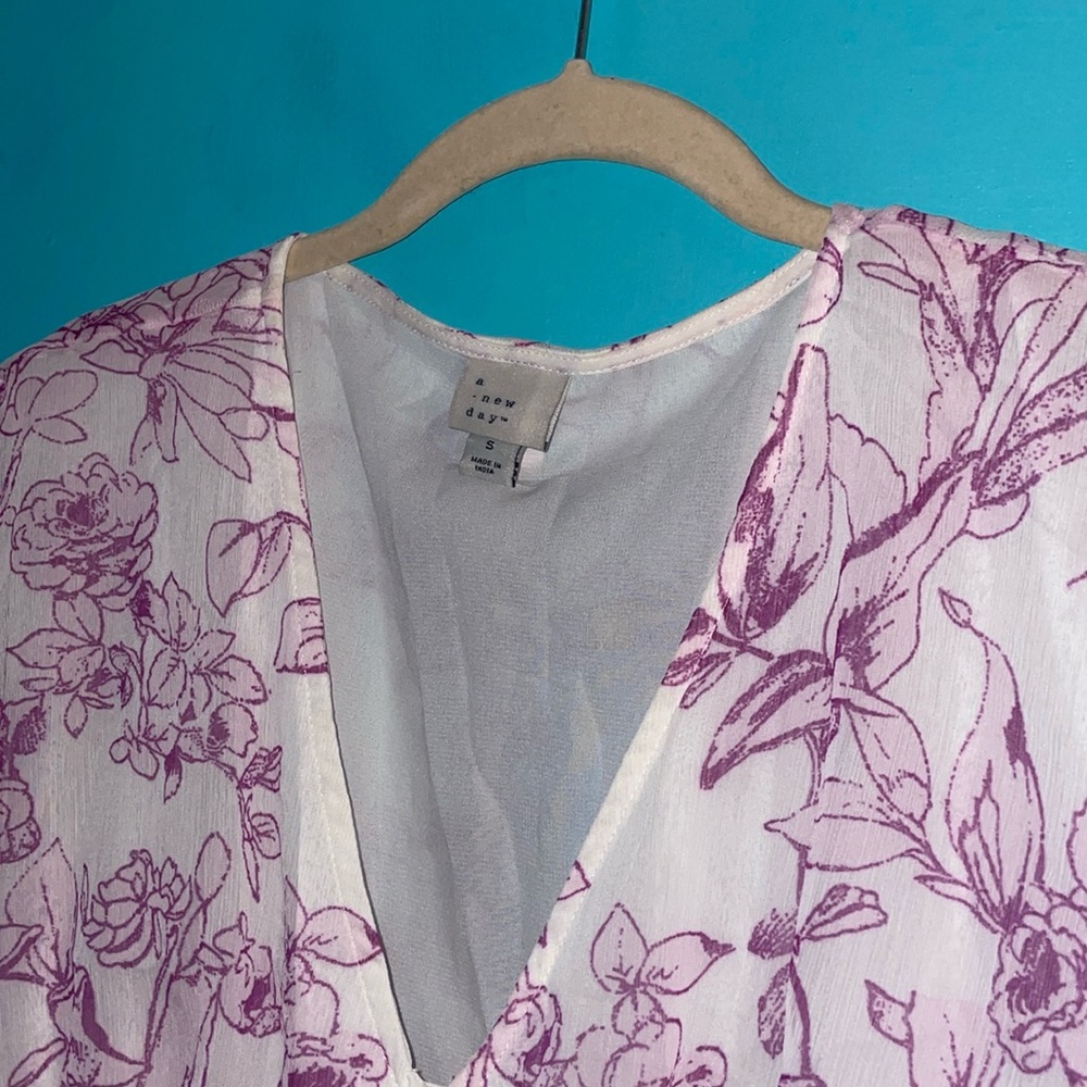 A New Day Purple Floral dress size small has dolman sleeves and two pockets